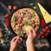 imageNutriChef 13Inch Nonstick Pizza Tray  Round Carbon Steel NonStick Pizza Baking Pan with Perforated Holes Premium Bakeware Pizza Screen with Silicone Grip Handles Dishwasher Safe  NCBPIZ1Black 1