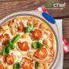 imageNutriChef 13Inch Nonstick Pizza Tray  Round Carbon Steel NonStick Pizza Baking Pan with Perforated Holes Premium Bakeware Pizza Screen with Silicone Grip Handles Dishwasher Safe  NCBPIZ1Gold
