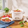 image:imageAROMA CoreCoat Mini Rice Cooker 3 Cups Cooked with Nonstick Ceramic Pot Coating Glass Lid and PopUp Steamer Tray 08 QuartCream