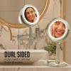 imageOVENTE 7 Lighted Makeup Mirror with 1X8X Magnification Cordless MultiFunctional Round Vanity Mirror with 360 Swivel Design Double Sided and Three Toned LED Lights Nickel Brushed MFM70BR1X8XNickle Brushed