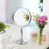 imageOVENTE 7 Lighted Makeup Mirror with 1X8X Magnification Cordless MultiFunctional Round Vanity Mirror with 360 Swivel Design Double Sided and Three Toned LED Lights Nickel Brushed MFM70BR1X8XPolished Chrome