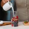 imageOVENTE Electric Immersion Hand Blender 300 Watt 2 Mixing Speed with Stainless Steel Blades Powerful Portable Easy Control Grip Stick Mixer Perfect for Smoothies Puree Baby Food ampamp Soup Red HS560RWith Attachment  Red