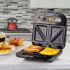 imageOVENTE Electric Sandwich Maker with NonStick Plates Indicator Lights Cool Touch Handle Easy to Clean and Store Perfect for Cooking Breakfast Grilled Cheese Tuna Melts and Snacks Black GPS401BGPS401B