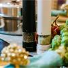 imageOVENTE Set of 2 Electric Salt ampamp Pepper Mill Grinder Battery Powered Stainless Steel Blades Automatic One Handed Operation with light and Adjustable Coarseness Black and White SPD102BW