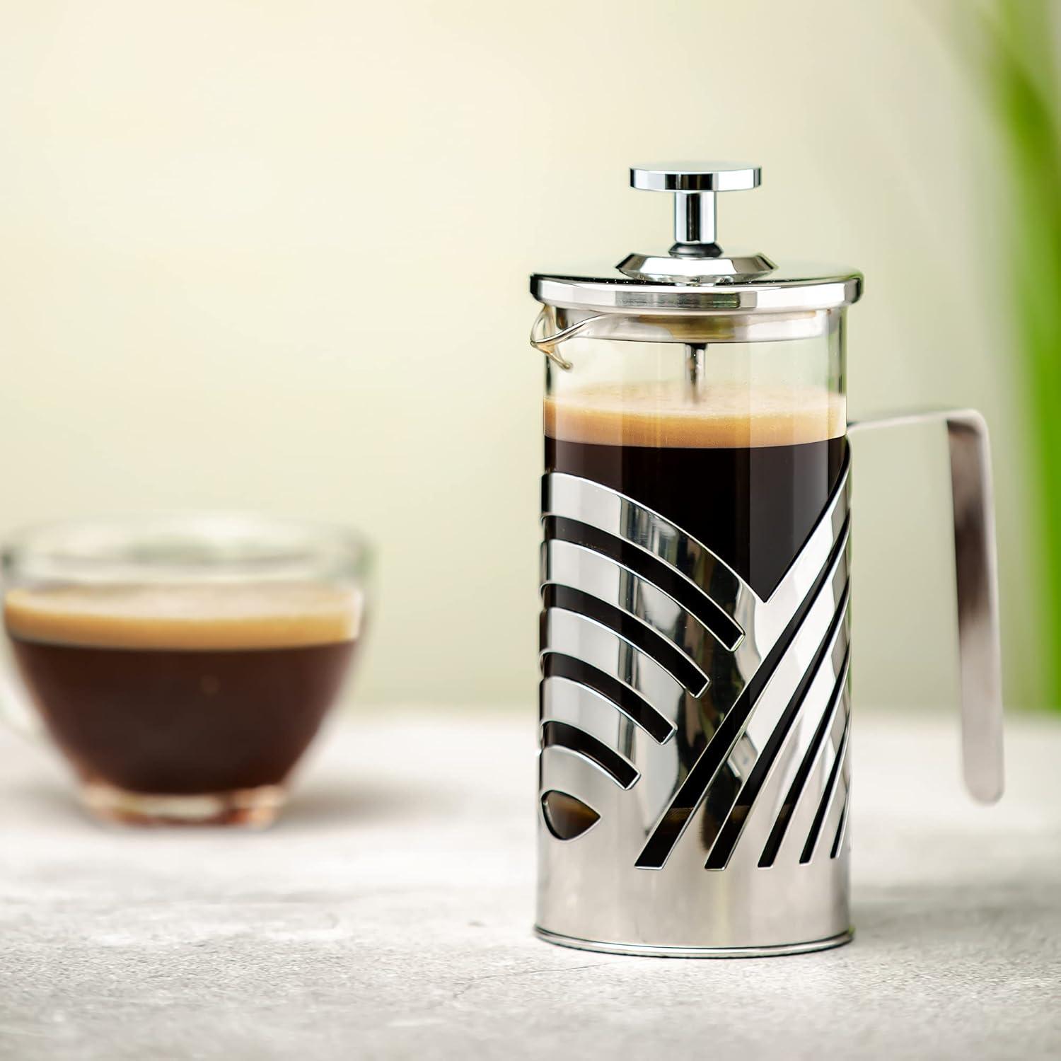 imageOVENTE French Press Coffee Maker 27 Ounce 4 Level Stainless Steel Filter System ampamp Heat Resistant Borosilicate Glass Portable Pitcher for Travel Gift Easy Clean Carafe w Scoop Silver FSS27PFSD12P