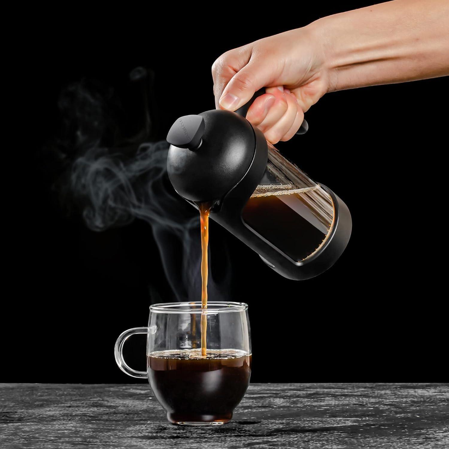 imageOVENTE French Press Coffee Maker 34 Ounce Heat Resistant Borosilicate Glass with 4 Filter StainlessSteel System BPAFree Portable Pitcher Perfect for Hot ampamp Cold Brew Red FPT34RFPB  Black
