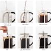 imageOVENTE 2in1 Coffee Press and Tea Maker with High Grade Stainless Steel Retractable Infuser Heat Tempered Borosilicate Glass and Silicone Handle 27 Ounce with Free Measuring Scoop Clear FGC27T27 Ounce