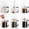 imageOVENTE 2in1 Coffee Press and Tea Maker with High Grade Stainless Steel Retractable Infuser Heat Tempered Borosilicate Glass and Silicone Handle 27 Ounce with Free Measuring Scoop Clear FGC27T34 Ounce