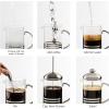 imageOVENTE French Press Coffee Maker 20 Ounce 4 Level Stainless Steel Filter System Borosilicate Heat Resistant Glass Carafe with Free Measuring Scoop Silver FSL20S20 Ounce