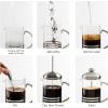 imageOVENTE French Press Coffee Maker 20 Ounce 4 Level Stainless Steel Filter System Borosilicate Heat Resistant Glass Carafe with Free Measuring Scoop Silver FSL20S34 Ounce