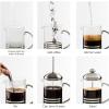 imageOVENTE French Press Coffee Maker 20 Ounce 4 Level Stainless Steel Filter System Borosilicate Heat Resistant Glass Carafe with Free Measuring Scoop Silver FSL20S12 Ounce