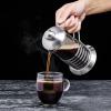 imageOVENTE French Press Coffee Maker 20 Ounce 4 Level Stainless Steel Filter System Borosilicate Heat Resistant Glass Carafe with Free Measuring Scoop Silver FSL20S12 Ounce
