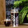 imageOVENTE French Press Coffee Maker 27 Ounce 4 Level Stainless Steel Filter System ampamp Heat Resistant Borosilicate Glass Portable Pitcher for Travel Gift Easy Clean Carafe w Scoop Silver FSS27PFSD34P