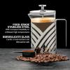 imageOVENTE French Press Coffee Maker 27 Ounce 4 Level Stainless Steel Filter System ampamp Heat Resistant Borosilicate Glass Portable Pitcher for Travel Gift Easy Clean Carafe w Scoop Silver FSS27PFSD20P