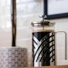 imageOVENTE French Press Coffee Maker 27 Ounce 4 Level Stainless Steel Filter System ampamp Heat Resistant Borosilicate Glass Portable Pitcher for Travel Gift Easy Clean Carafe w Scoop Silver FSS27PFSD20P