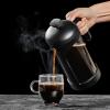 imageOVENTE French Press Coffee Maker 34 Ounce Heat Resistant Borosilicate Glass with 4 Filter StainlessSteel System BPAFree Portable Pitcher Perfect for Hot ampamp Cold Brew Red FPT34RFPB  Black
