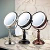 imageOvente 75quot Lighted Tabletop Vanity Makeup Mirror 1X ampamp 10X Magnifier Spinning Double Sided Round LED 3 Tone Smart Touch Auto Shut Off Timer Battery ampamp AC Plug Powered Antique Copper MPT75CO1X10XAntique Copper