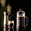 imageOvente French Press Coffee Tea and Espresso Maker Heat Resistant Borosilicate Glass with 4 Filter StainlessSteel System BPAFree Portable Pitcher Perfect for Hot ampamp Cold Brew 34oz Black FPT34BBlack