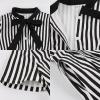 imageIDOPIP Women Black Striped Halloween Cosplay Costume Dress Elegant Tie Neck Midi Dress 1950s Vintage Cocktail Shirt DressBlack and White