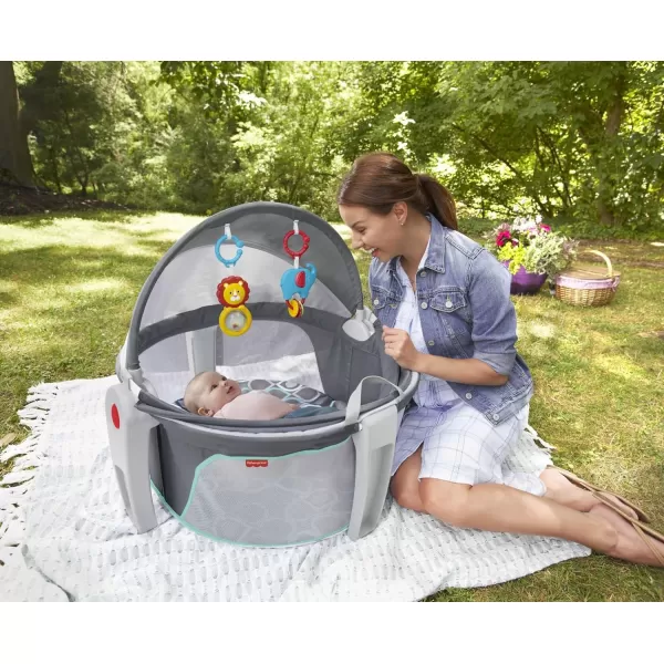 FisherPrice Baby Portable Bassinet and Play Space OntheGo Baby Dome with 2 Toys and Canopy Puppy Perfection Amazon ExclusiveBubbles