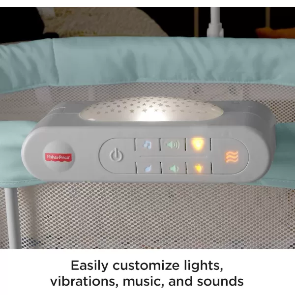 FisherPrice Baby Bedside Sleeper Soothing Motions Bassinet With Lights Music Vibrations amp Overhead Mobile Pacific PebblePacific Pebble