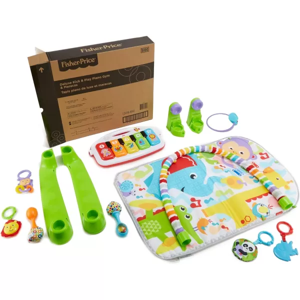 FisherPrice Baby Gift Set Deluxe Kick amp Play Piano Gym amp MaracasPlaymat amp Musical Toy with Smart Stages Learning Content plus 2 Rattles Amazon ExclusiveKick N Play Green  Maracas