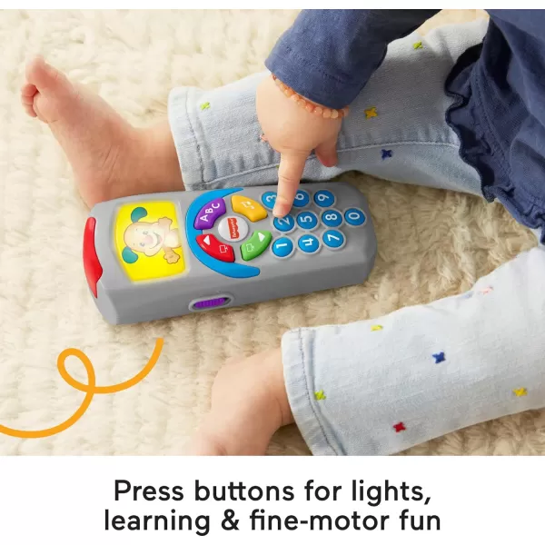 FisherPrice Laugh amp Learn Baby Learning Toy Puppys Remote Pretend TV Control with Music and Lights for Ages 6 MonthsLaugh amp Learn Puppys Remote