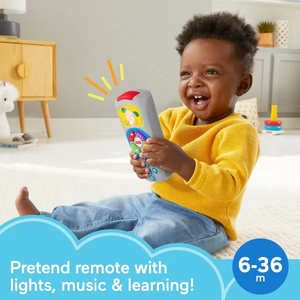 FisherPrice Laugh amp Learn Baby Learning Toy Puppys Remote Pretend TV Control with Music and Lights for Ages 6 MonthsLaugh amp Learn Puppys Remote