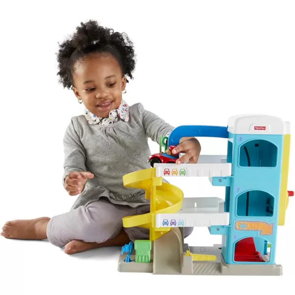 FisherPrice Little People Toddler Toy Helpful Neighbors Garage Playset with Spiral Ramp and 2 Wheelies Cars for Ages 18 MonthsFisherPrice Little People Toddler Toy Helpful Neighbors Garage Playset with Spiral Ramp and 2 Wheelies Cars for Ages 18 Months