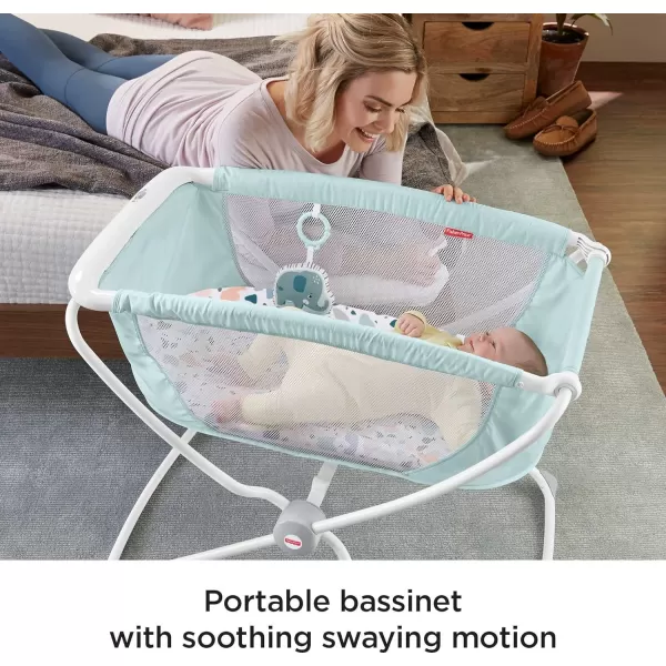 FisherPrice Rock With Me Bassinet  Pacific Pebble travel baby crib with rocking motion and mesh sidesPacific Pebble