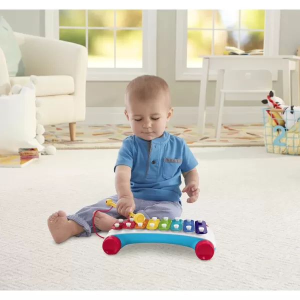 FisherPrice Toddler Pull Toy Classic Xylophone Pretend Musical Instrument with Mallet and Rolling Wheels for Ages 18 MonthsFisherPrice Toddler Pull Toy Classic Xylophone Pretend Musical Instrument with Mallet and Rolling Wheels for Ages 18 Months