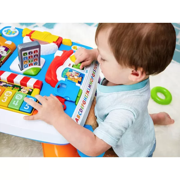 FisherPrice Laugh amp Learn Baby to Toddler Toy Around the Town Learning Table with Music Lights amp Activities for Ages 6 MonthsFisherPrice Laugh amp Learn Baby to Toddler Toy Around the Town Learning Table with Music Lights amp Activities for Ages 6 Months