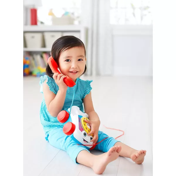 FisherPrice Toddler Pull Toy Chatter Telephone Pretend Phone With Rotary Dial And Wheels For Walking Play Ages 1 YearsFisherPrice Toddler Pull Toy Chatter Telephone Pretend Phone With Rotary Dial And Wheels For Walking Play Ages 1 Years