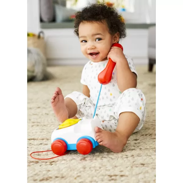 FisherPrice Toddler Pull Toy Chatter Telephone Pretend Phone With Rotary Dial And Wheels For Walking Play Ages 1 YearsFisherPrice Toddler Pull Toy Chatter Telephone Pretend Phone With Rotary Dial And Wheels For Walking Play Ages 1 Years