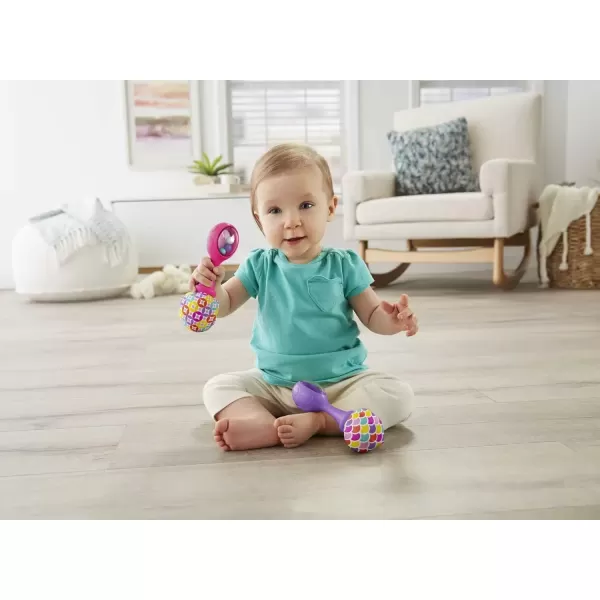 imageFisherPrice Newborn Toys Rattle n Rock Maracas 2 Soft Musical Instruments for Developmental Play Babies Ages 3 Months Pink ampamp PurpleRattle n Roll Maracas