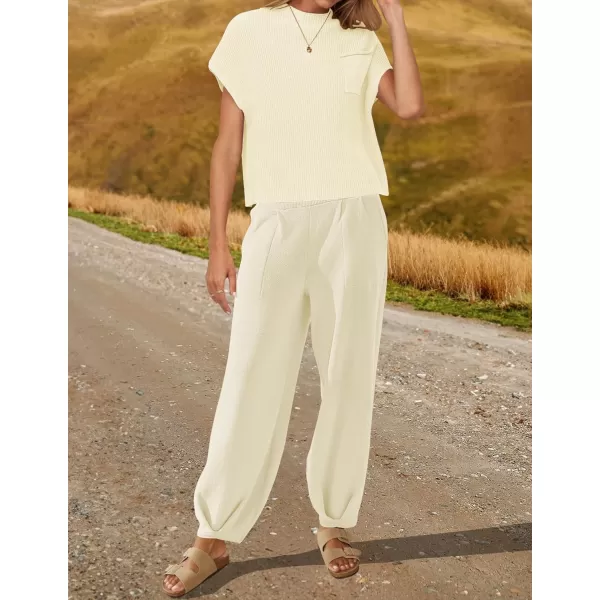 imageZESICA Womens 2 Piece Outfits Sweater Set Short Sleeve Mock Neck Knit Pullover Top High Waist Pant Tracksuit Lounge SetsIvory