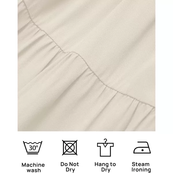 imageZESICA Womens 2023 Casual Crew Neck Flutter Sleeve Smocked High Waist Hollow Out Lace Trim Tiered A Line Midi DressApricot