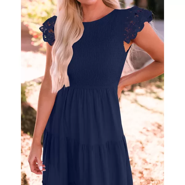 imageZESICA Womens 2023 Casual Crew Neck Flutter Sleeve Smocked High Waist Hollow Out Lace Trim Tiered A Line Midi DressNavy