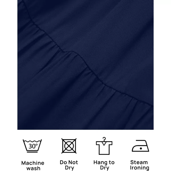imageZESICA Womens 2023 Casual Crew Neck Flutter Sleeve Smocked High Waist Hollow Out Lace Trim Tiered A Line Midi DressNavy