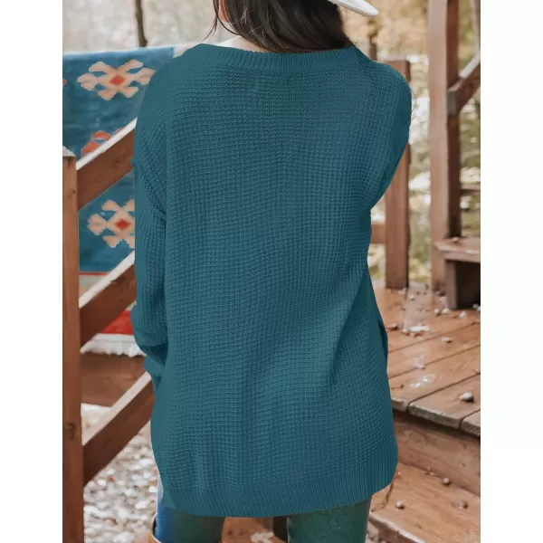 imageZESICA Womens 2023 Casual V Neck Sweater Loose Long Sleeve Waffle Knit Button Henley Pullover Jumper TopDustygreen