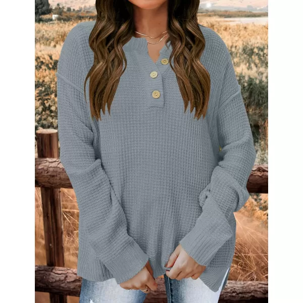 imageZESICA Womens 2023 Casual V Neck Sweater Loose Long Sleeve Waffle Knit Button Henley Pullover Jumper TopGrey