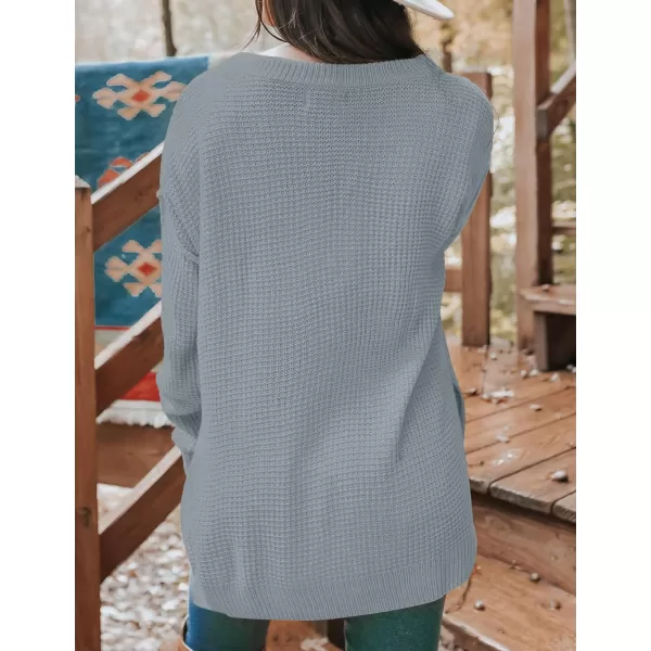 imageZESICA Womens 2023 Casual V Neck Sweater Loose Long Sleeve Waffle Knit Button Henley Pullover Jumper TopGrey