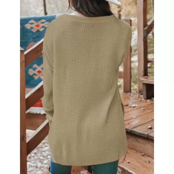 imageZESICA Womens 2023 Casual V Neck Sweater Loose Long Sleeve Waffle Knit Button Henley Pullover Jumper TopKhaki