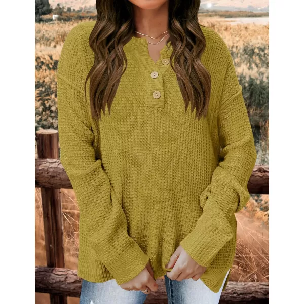 imageZESICA Womens 2023 Casual V Neck Sweater Loose Long Sleeve Waffle Knit Button Henley Pullover Jumper TopMustard