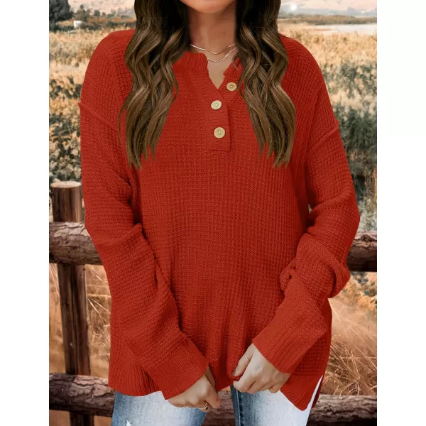imageZESICA Womens 2023 Casual V Neck Sweater Loose Long Sleeve Waffle Knit Button Henley Pullover Jumper TopOrange