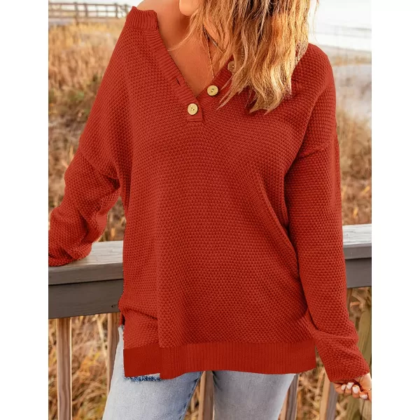 imageZESICA Womens 2023 Casual V Neck Sweater Loose Long Sleeve Waffle Knit Button Henley Pullover Jumper TopOrange