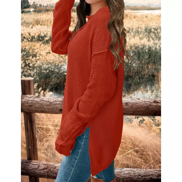 imageZESICA Womens 2023 Casual V Neck Sweater Loose Long Sleeve Waffle Knit Button Henley Pullover Jumper TopOrange
