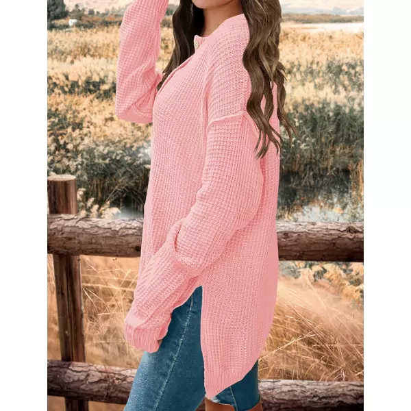 imageZESICA Womens 2023 Casual V Neck Sweater Loose Long Sleeve Waffle Knit Button Henley Pullover Jumper TopPink