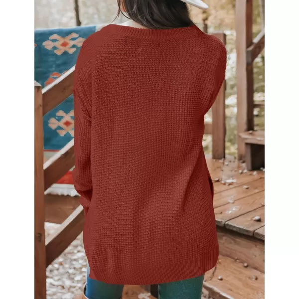 imageZESICA Womens 2023 Casual V Neck Sweater Loose Long Sleeve Waffle Knit Button Henley Pullover Jumper TopRust