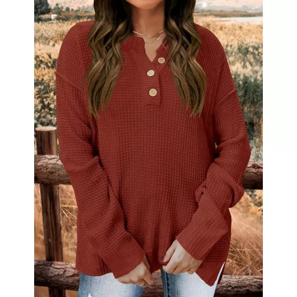 imageZESICA Womens 2023 Casual V Neck Sweater Loose Long Sleeve Waffle Knit Button Henley Pullover Jumper TopRust